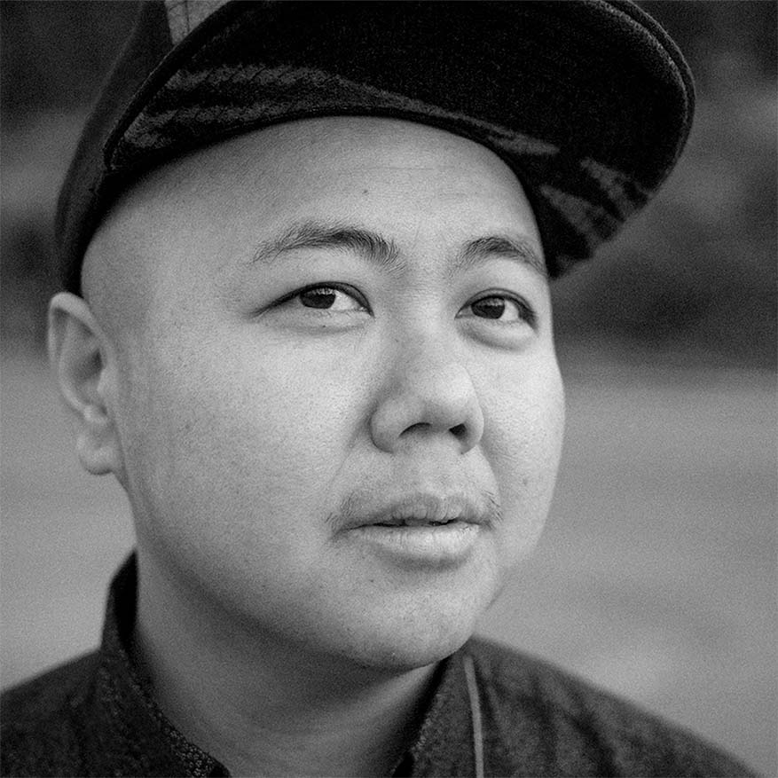 Black and white photograph of Kit Yan