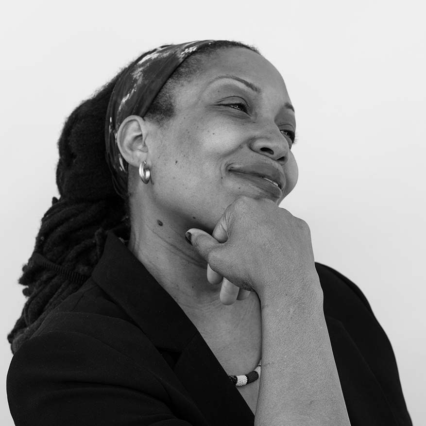 Black and white photograph of Darnell Benoit, founder of Flanbwayan and advocate for immigrant youth city-wide