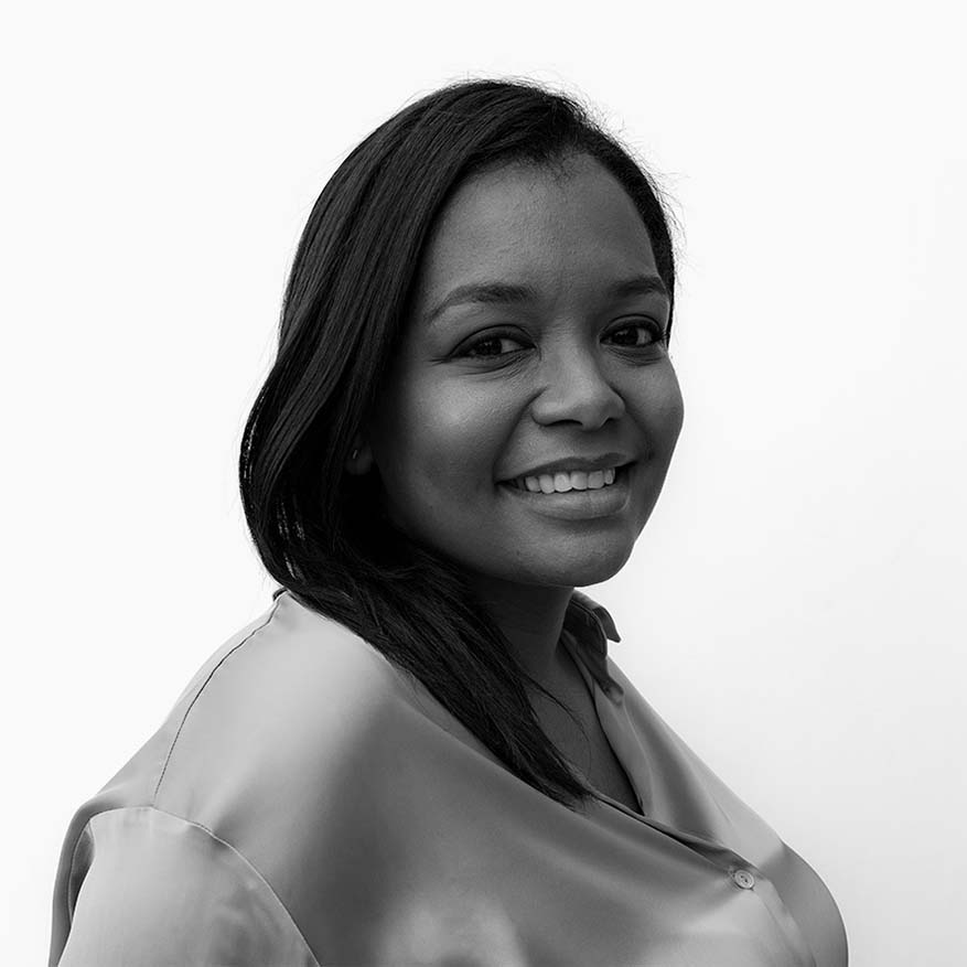 Black and white photograph of Jihan Thompson who is building tech tools and support for NYC hairstylists and cosmetologists who serve communities of color.